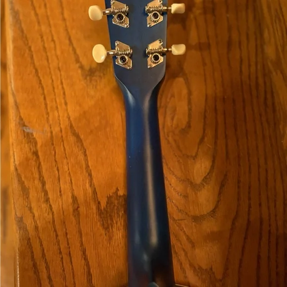 Blue Ukulele with Wooden Fretboard and case - Picture 10 of 13